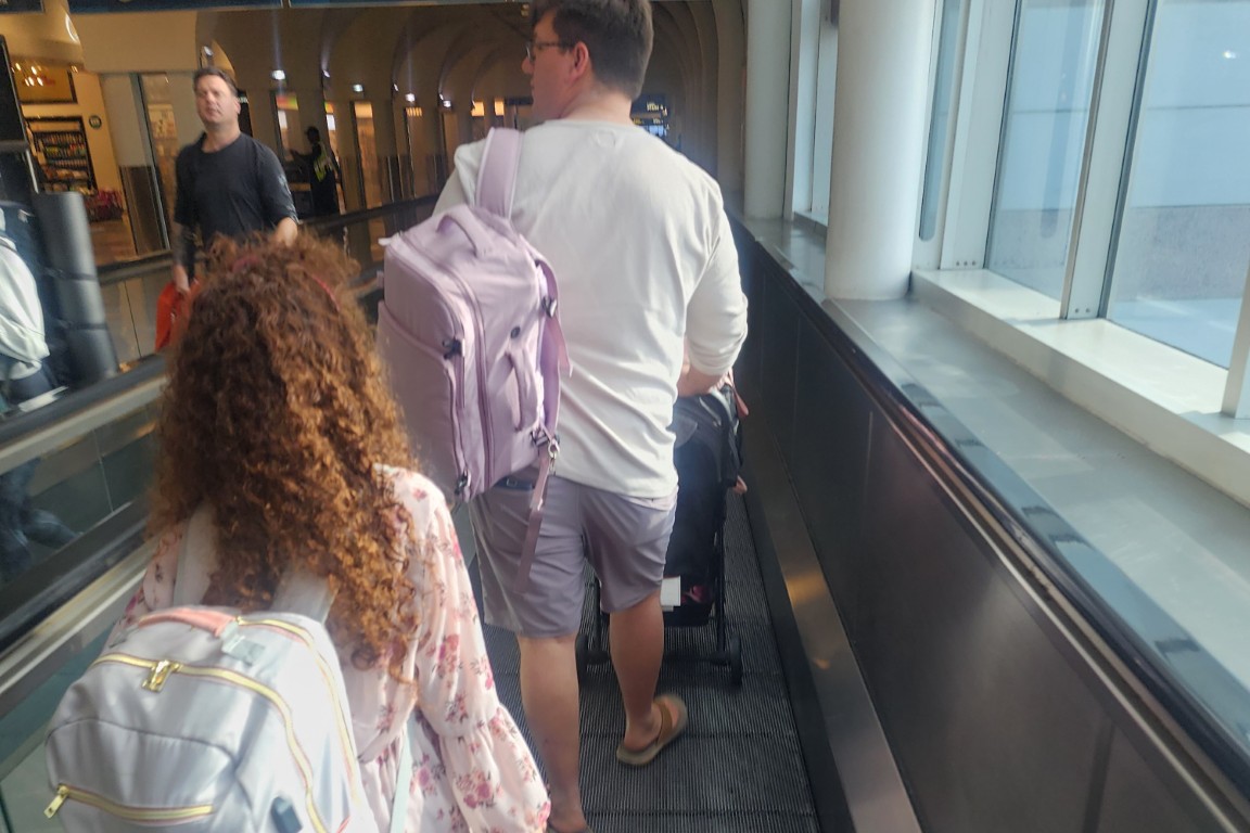 Family Traveling With Strollers, Car Seats, And Baby Gear