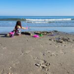 Girl_Playing_At_Myrtle_Beach_South_Carolina_SC_Shoreline_Sandcastle