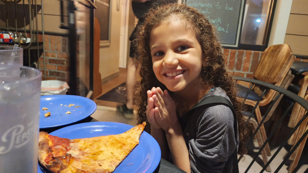 Eating pizza while taking a break