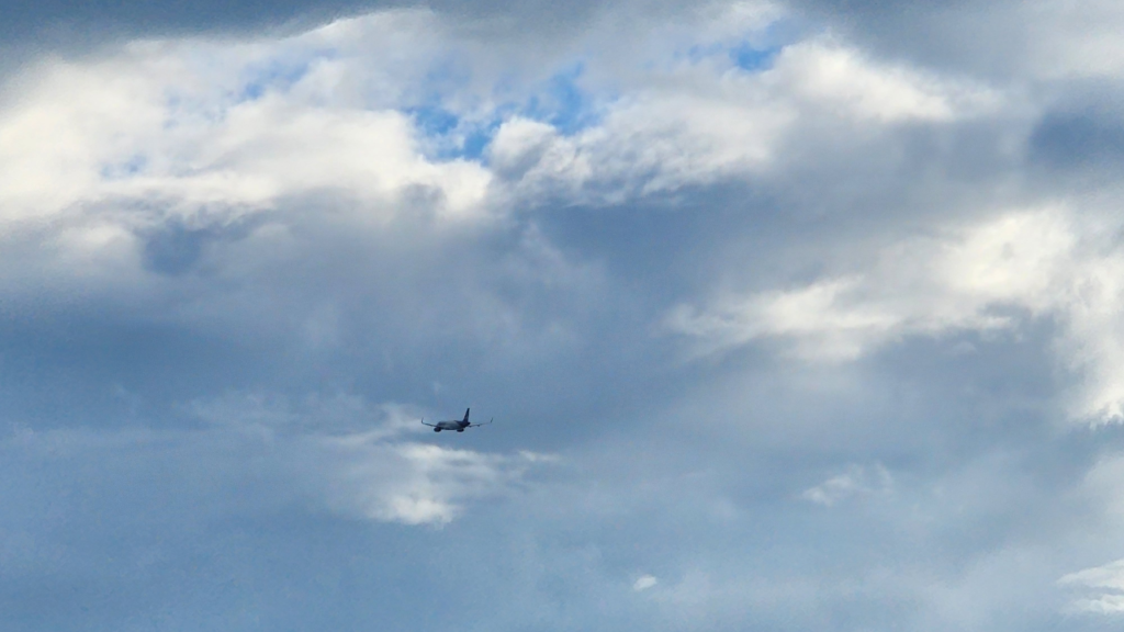 Travel Activities To Keep Kids Entertained on Long Trips - Play I Spy in the Sky