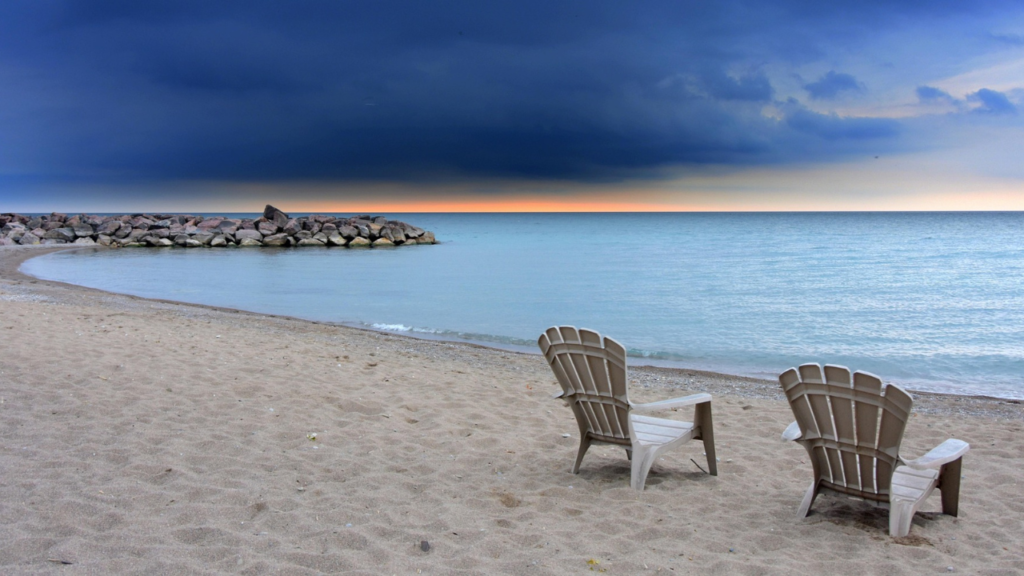 Lounging plastic beach chairs