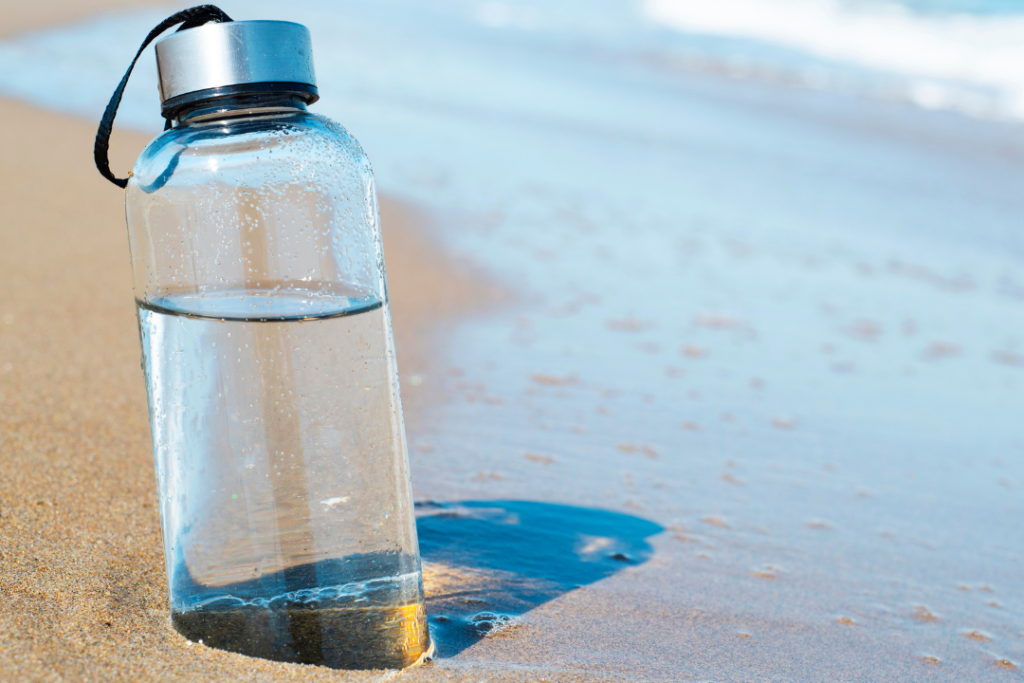 How To Protect Your Family From the Sun at the Beach (10 Eco-Friendly Ways) - Stay Hydrated With Water